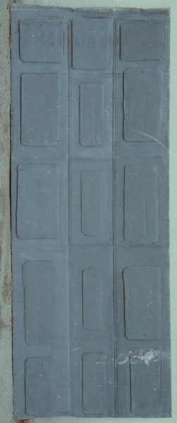 Grey door with panelling