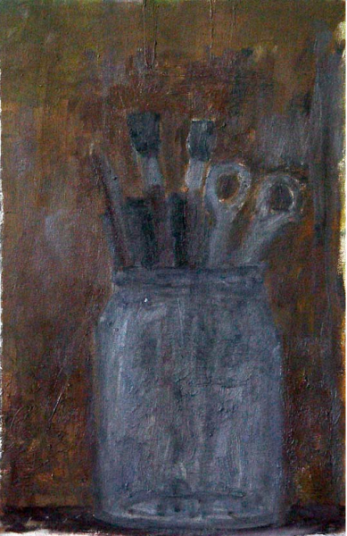Brushes and scissors in a jar