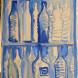 Blue bottles on beige background