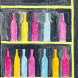 Multicolored bottles on a black background